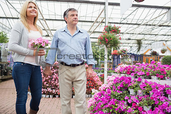 Couple walking around garden center