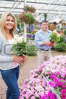 Couple choosing flowers together