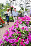 Couple searching for flowers outside the garden centre