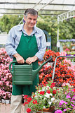 Man holding a watering can
