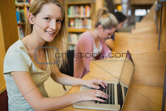 Student looking up from laptop