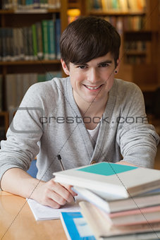 Man sitting at library desk