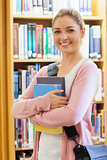 Student standing at the library