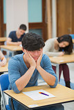 Student looking helpless in exam