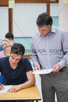 Teacher talks to a student