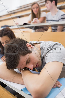 Student sleeping at the lecture hall