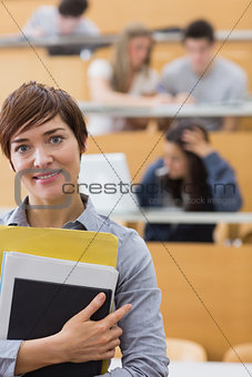 Teacher standing at the lecture hall