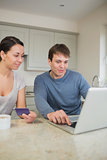 Two people purchasing online