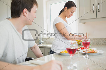 Wife preparing lunch for husband