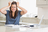 Woman getting frustrated over bills