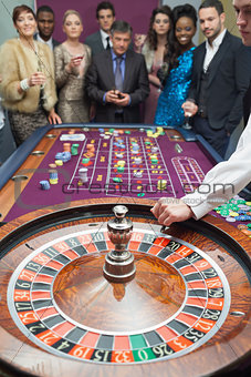 People standing at the roulette