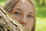 portrait of young teenager girl in park