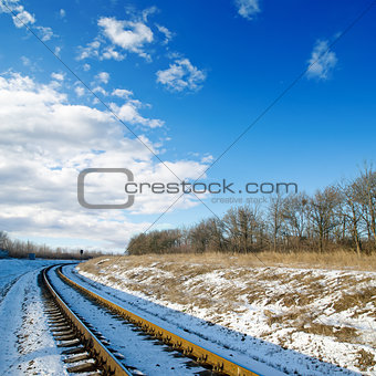 railroad to sunset. winter time