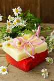 handmade soap with flowers on the organic background