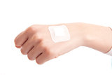 hand with adhesive bandage