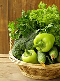 various green vegetables (peppers, broccoli, cucumbers, green onions, lettuce)