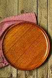 empty wooden plate on the old wooden table