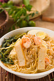 malaysian famous prawn noodle or har mee with decorations on bac