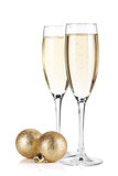 Champagne glasses and christmas balls