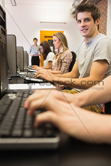 Student sitting at the computer working