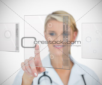 Woman standing while smiling touching interface