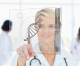 Woman pressing on DNA helix interface