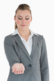 Businesswoman looking at her hand
