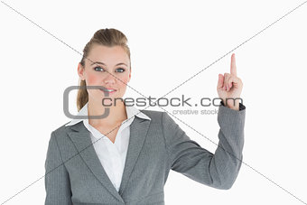 Businesswoman is pointing up