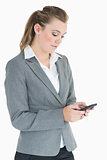 Businesswoman texting with her smartphone