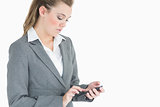 Businesswoman touching on smartphone