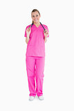 Smiling woman in pink scrubs
