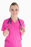 Happy woman wearing pink scrubs