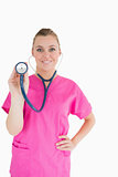 Smiling woman holding a stethoscope