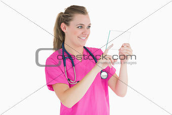 Doctor selecting something on clear pane