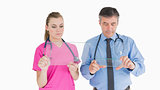 Doctors holding glass slides
