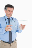 Doctor holding a clear pane