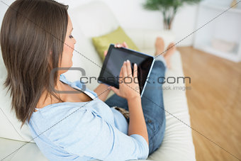 Woman using her digital tablet