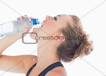 Woman drinking after workout
