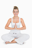 Girl sitting cross-legged in yoga pose