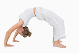 Girl in upward bow yoga pose