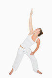 Woman in extended triangle yoga pose