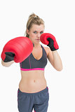 Woman standing in boxing gear