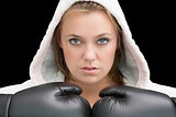 Woman wearing boxing gloves and robe