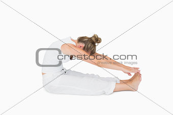 Woman sitting stretching