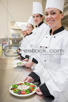 Chef's presenting their salads