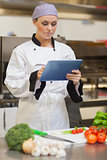 Chef consulting digital tablet