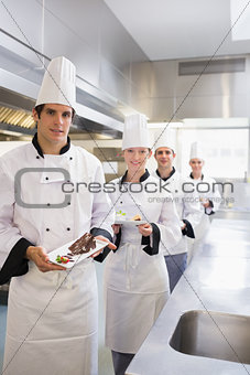 Team of Chef's presenting deserts