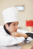 Thoughtful chef looking away