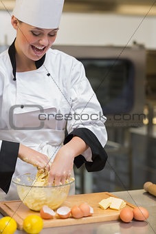 Pastry chef mixing dough