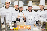 Culinary class with pastry teacher giving thumbs up